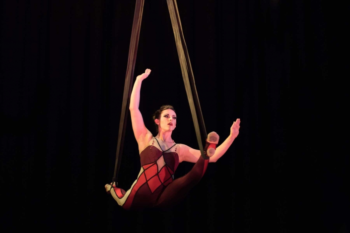 necca-keene-sentinal-march-2017-FEAT photo of a woman performing a split on aerial straps