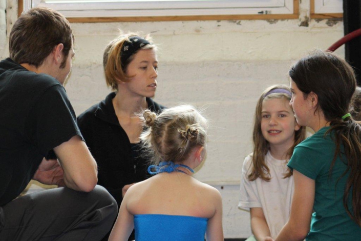 necca-wcax-february-2015 photo of a NECCA coach speaking with several young students