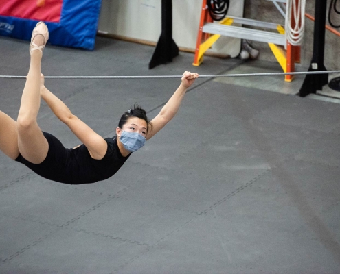 image of a professional student training on tightwire