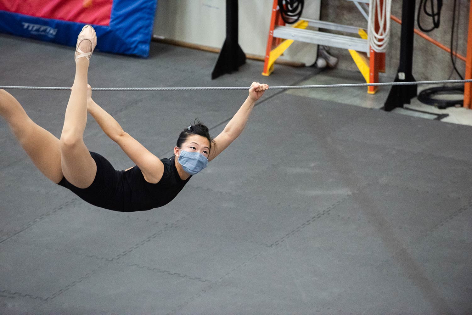 image of a professional student training on tightwire