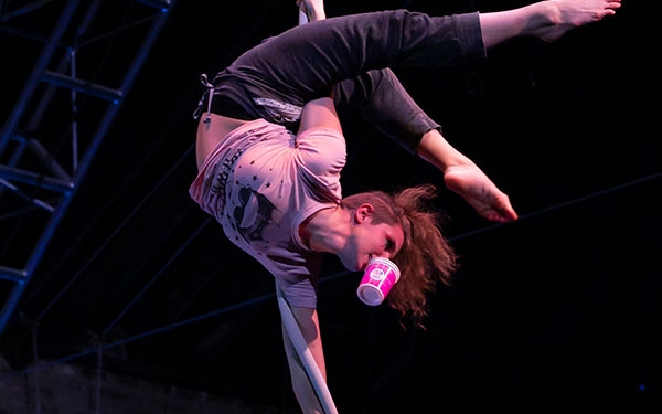 kim melohn performing on aerial rope
